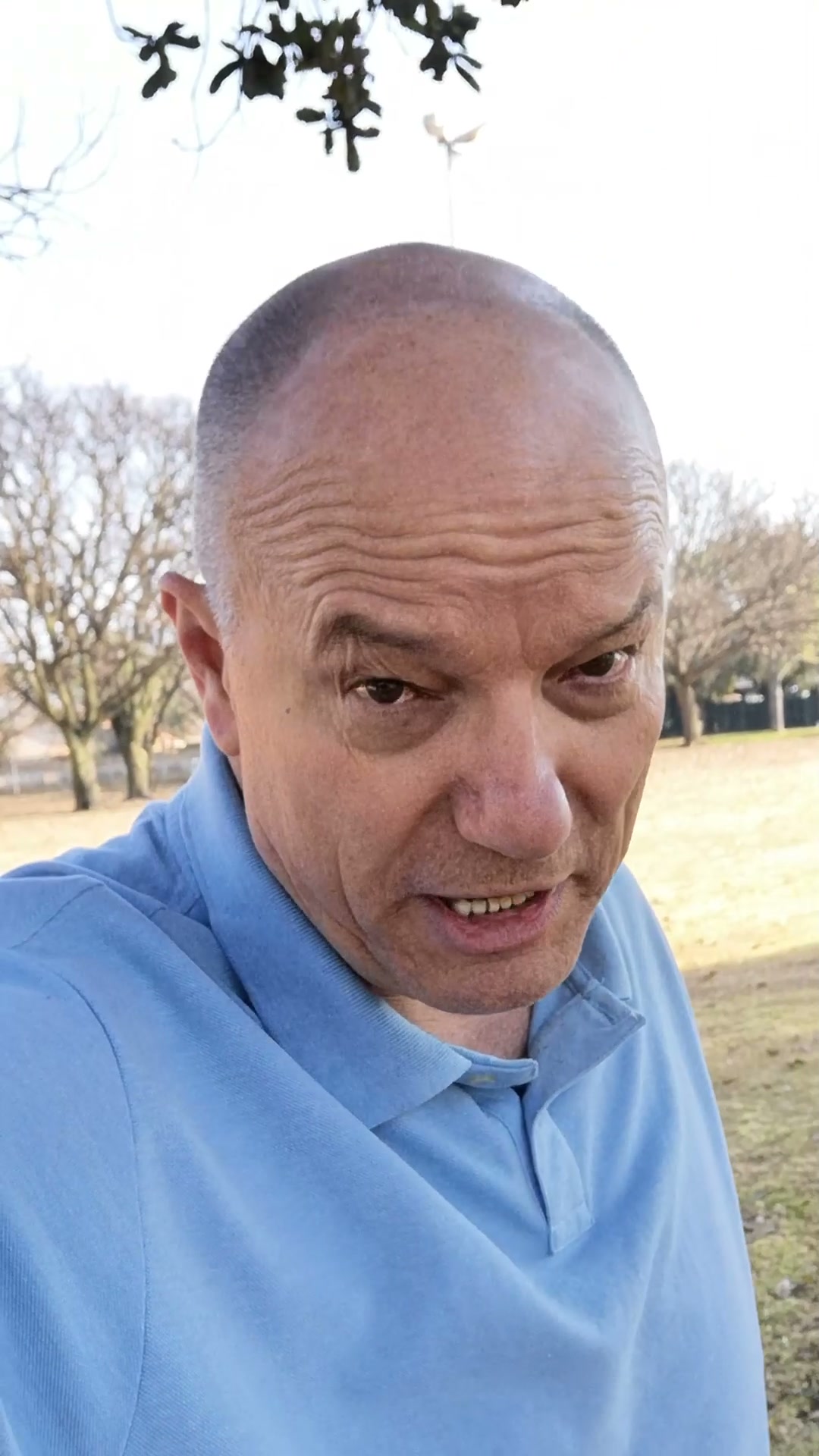 Perry, on camera in a park